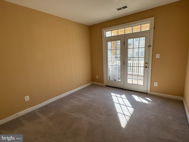 entryway with light carpet