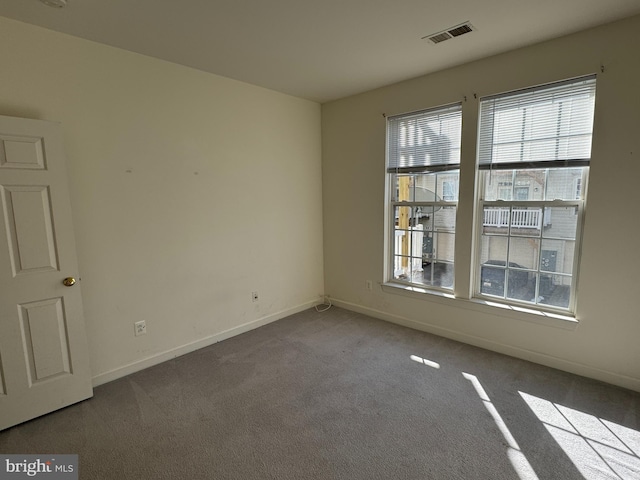 view of carpeted spare room