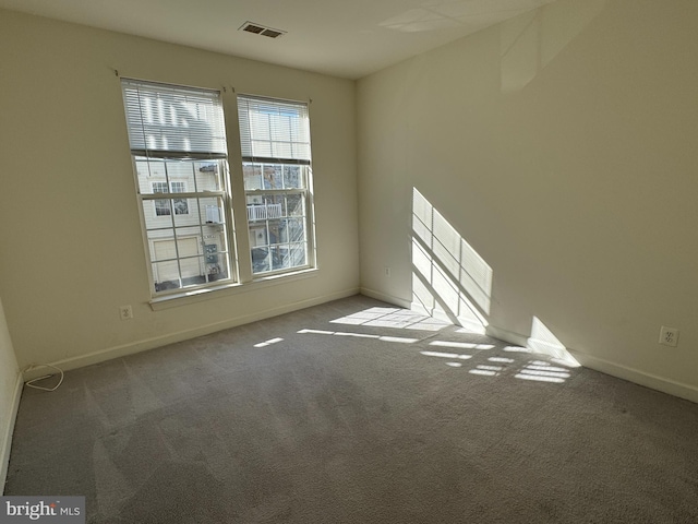 view of carpeted spare room