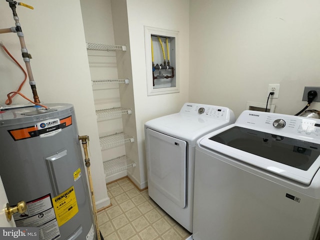 washroom featuring separate washer and dryer and water heater