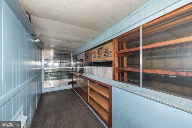 interior space with dark tile patterned floors