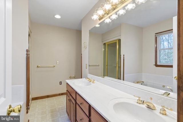 bathroom featuring vanity and a bathtub