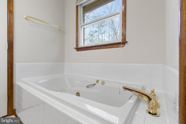 bathroom with tiled tub