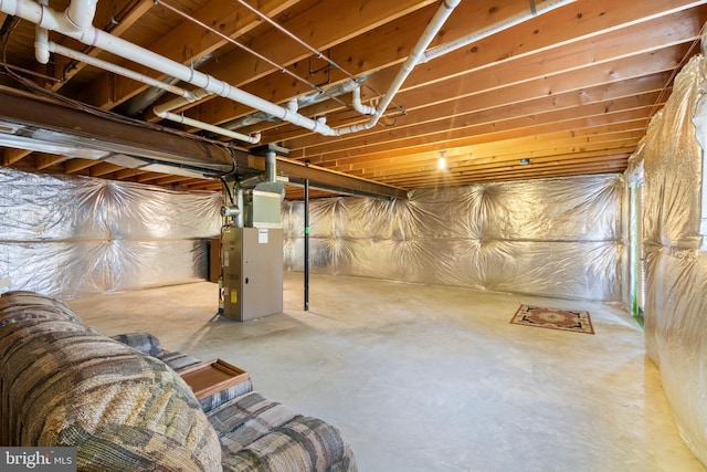 basement featuring heating unit