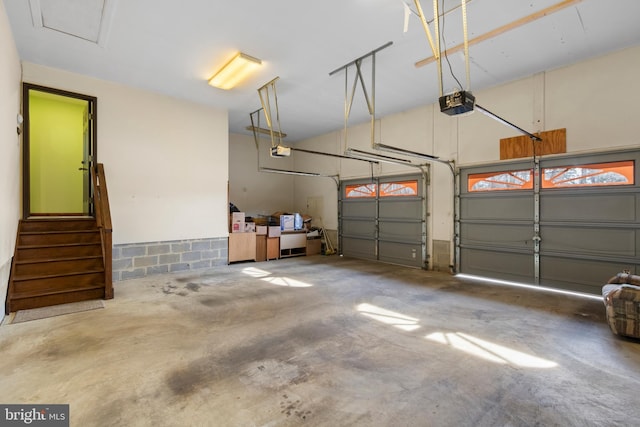 garage featuring a garage door opener