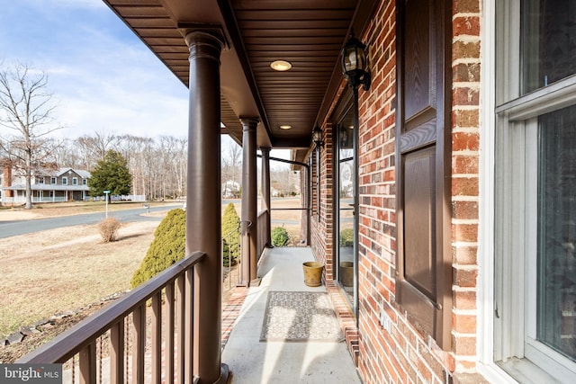 balcony featuring a porch