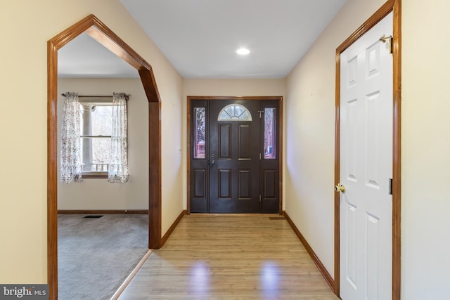 entrance foyer featuring light hardwood / wood-style floors