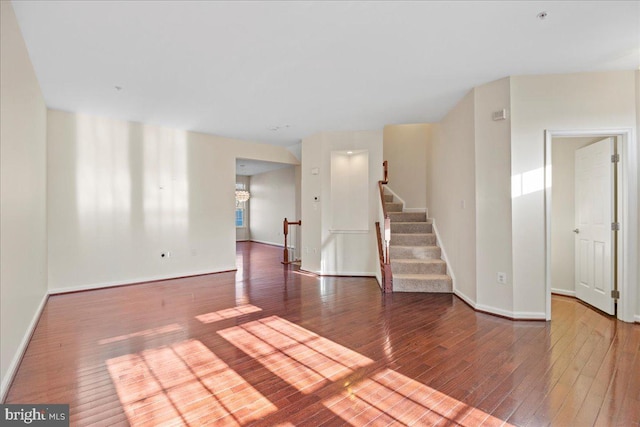 spare room featuring dark hardwood / wood-style floors