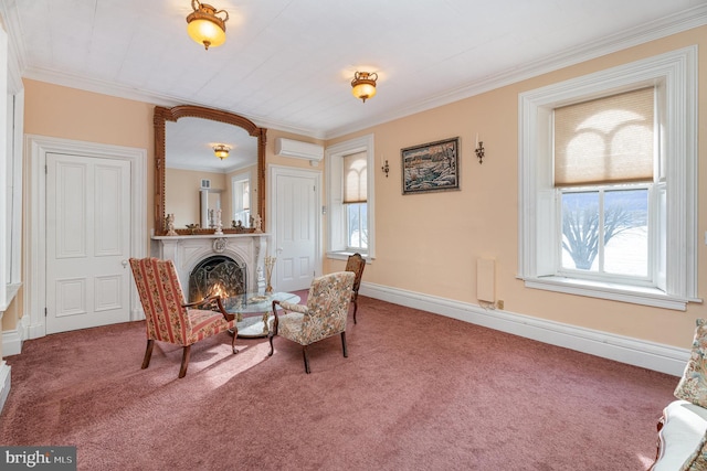 sitting room with crown molding, carpet, a healthy amount of sunlight, and a wall mounted air conditioner