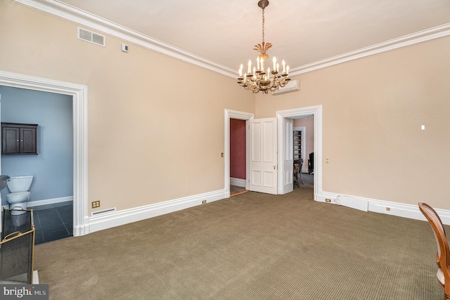 interior space featuring an inviting chandelier, crown molding, and a wall unit AC