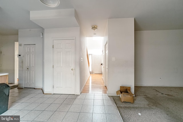 interior space with light tile patterned floors