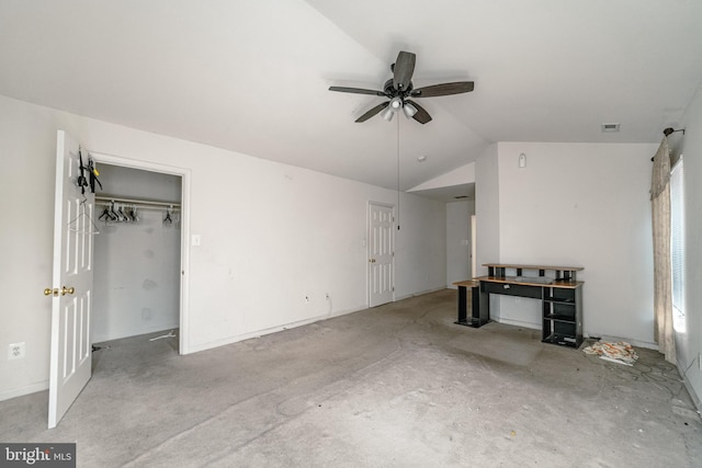 unfurnished living room with vaulted ceiling and ceiling fan