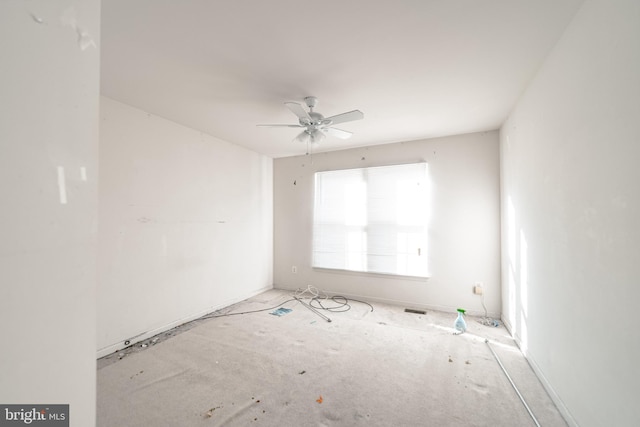 unfurnished room with ceiling fan