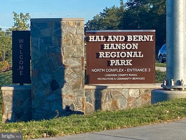 view of community sign