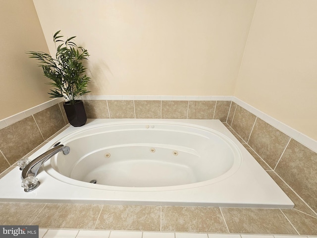 bathroom featuring a relaxing tiled tub