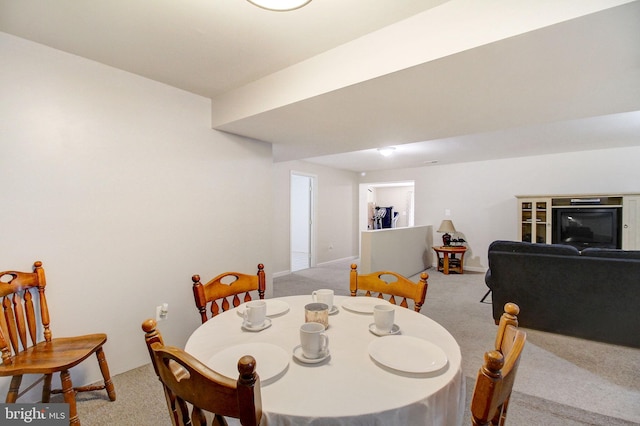 view of carpeted dining space