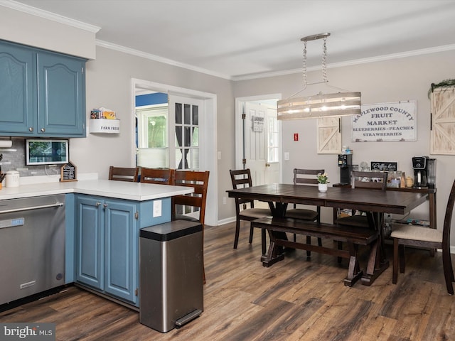 kitchen featuring blue cabinets, pendant lighting, dark wood-type flooring, and stainless steel dishwasher