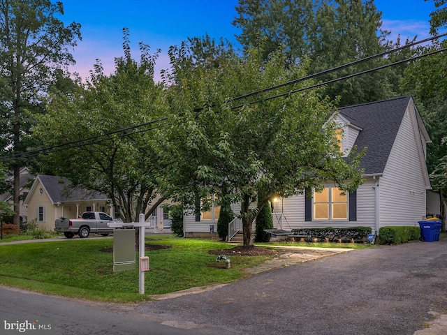 view of front of property with a yard