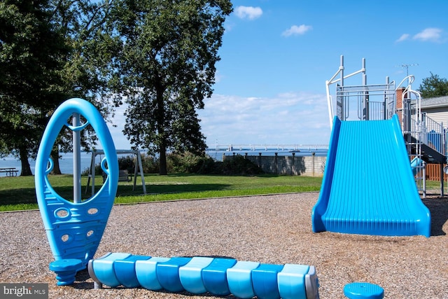 view of playground featuring a lawn