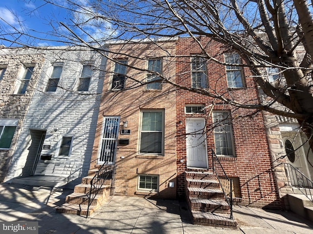 view of front of house with a patio area