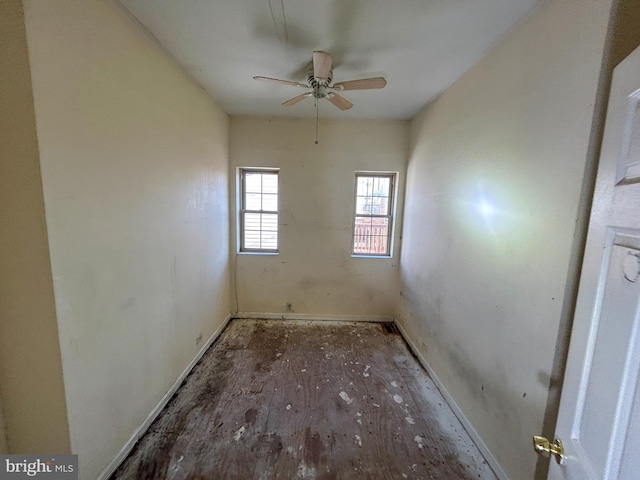 unfurnished room with ceiling fan