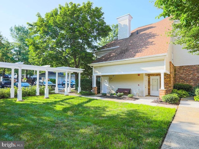 view of yard with a pergola