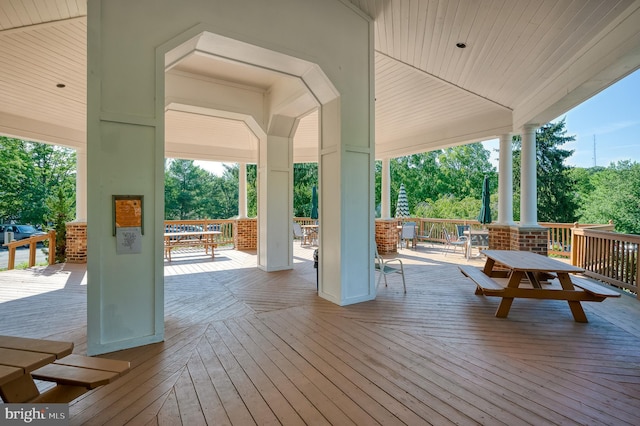 deck with outdoor dining space