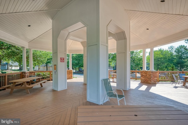 wooden deck featuring covered porch