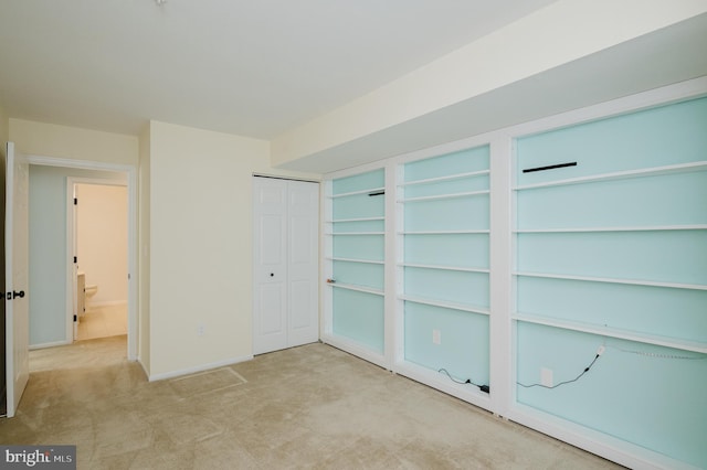 unfurnished bedroom with carpet flooring