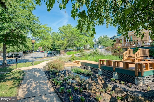 view of community with a wooden deck