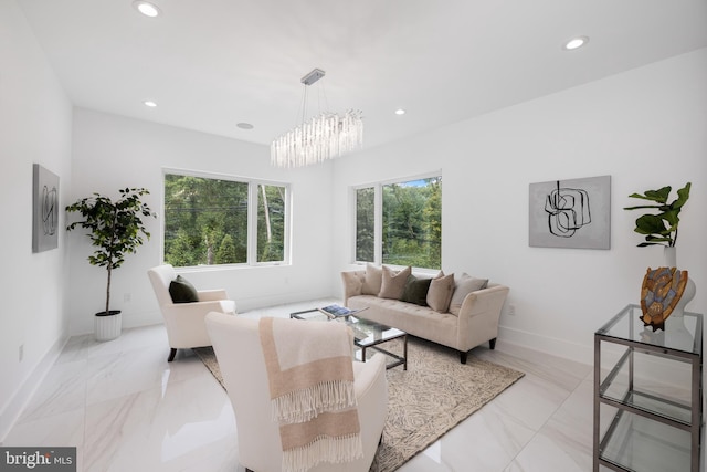 living room featuring an inviting chandelier