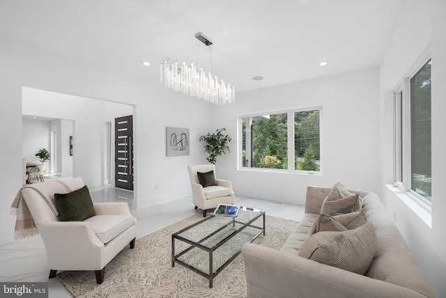 living room with a notable chandelier