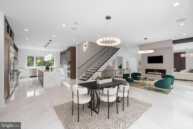 dining space with a chandelier