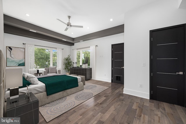 bedroom with dark wood-type flooring and ceiling fan