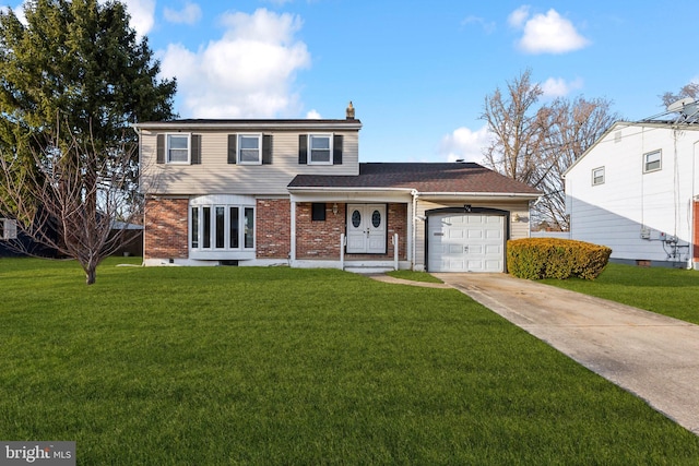 front of property featuring a garage and a front yard