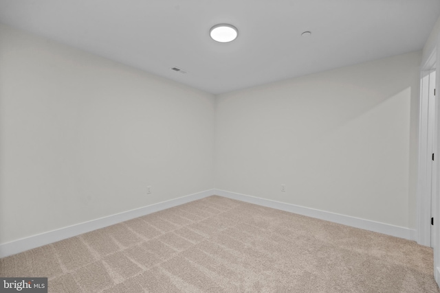 empty room with carpet floors