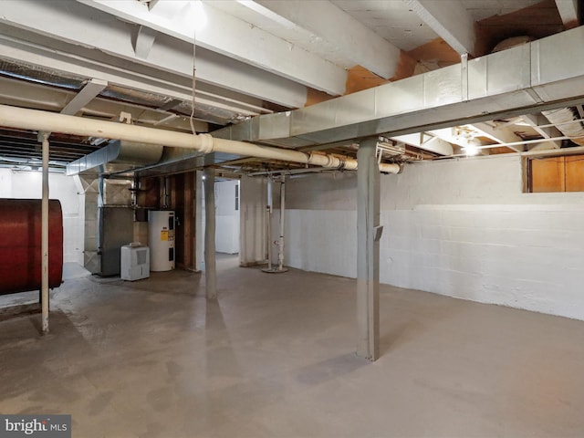 basement with heating unit and water heater