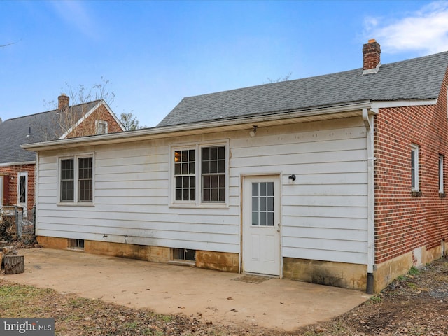 back of house featuring a patio area