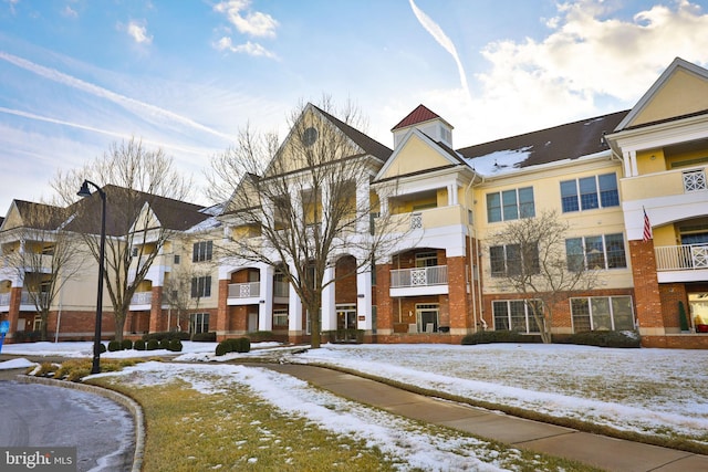 view of snow covered building