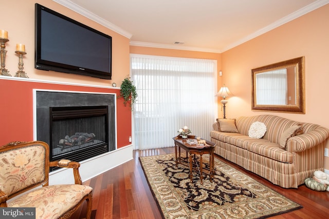 living room featuring ornamental molding and dark hardwood / wood-style flooring