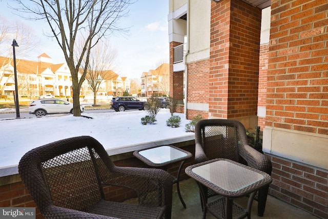 view of snow covered patio