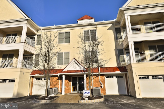 view of building exterior featuring central AC unit