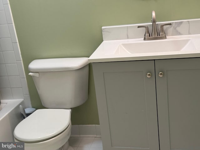 bathroom featuring walk in shower, tile patterned floors, vanity, and toilet