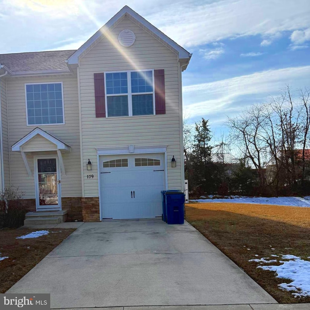 view of front of home with a garage