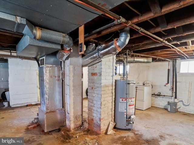 basement featuring washer / dryer and water heater