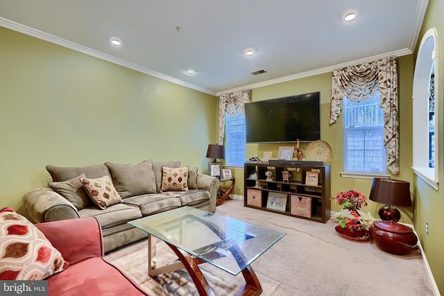 living room featuring ornamental molding and light carpet