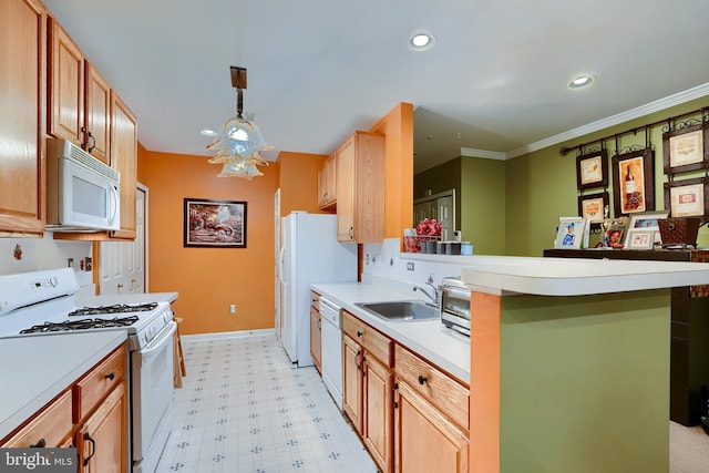 kitchen with crown molding, white appliances, sink, and hanging light fixtures