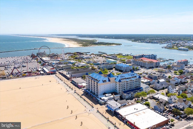 aerial view with a water view and a view of the beach