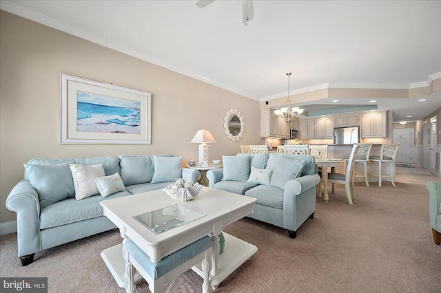 living room with crown molding, light carpet, and a chandelier