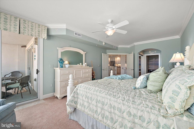 bedroom with ceiling fan, ornamental molding, and light carpet